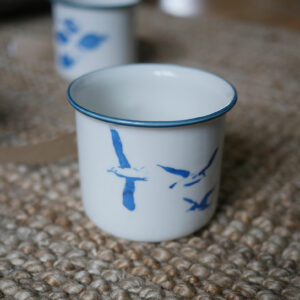 Tasse céramique avec illustration de bord de mer